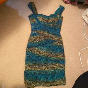 Fun and flirty snakeskin mini dress!